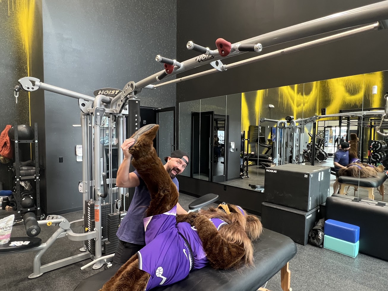 Shawn stretching a pro team mascot